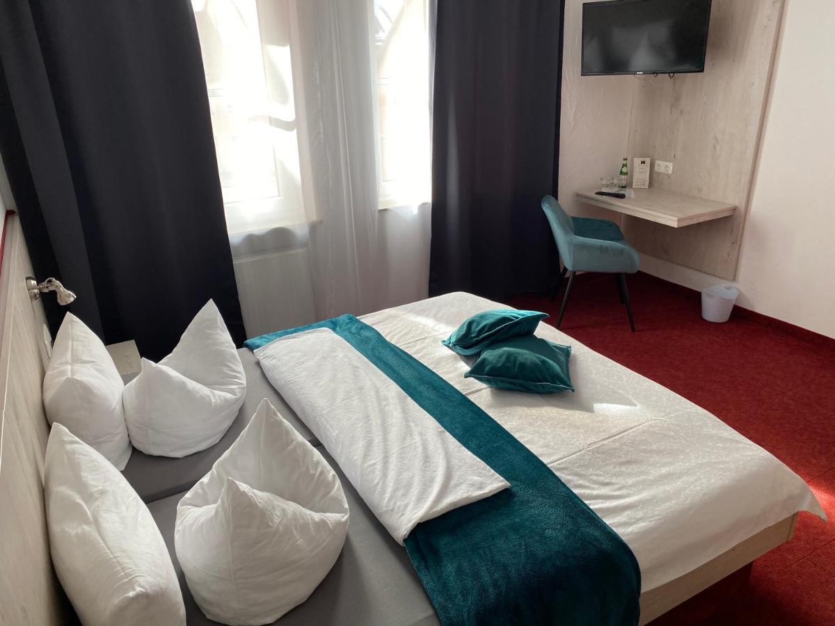 Hotel Wilder Mann Feuchtwangen Bagian luar foto