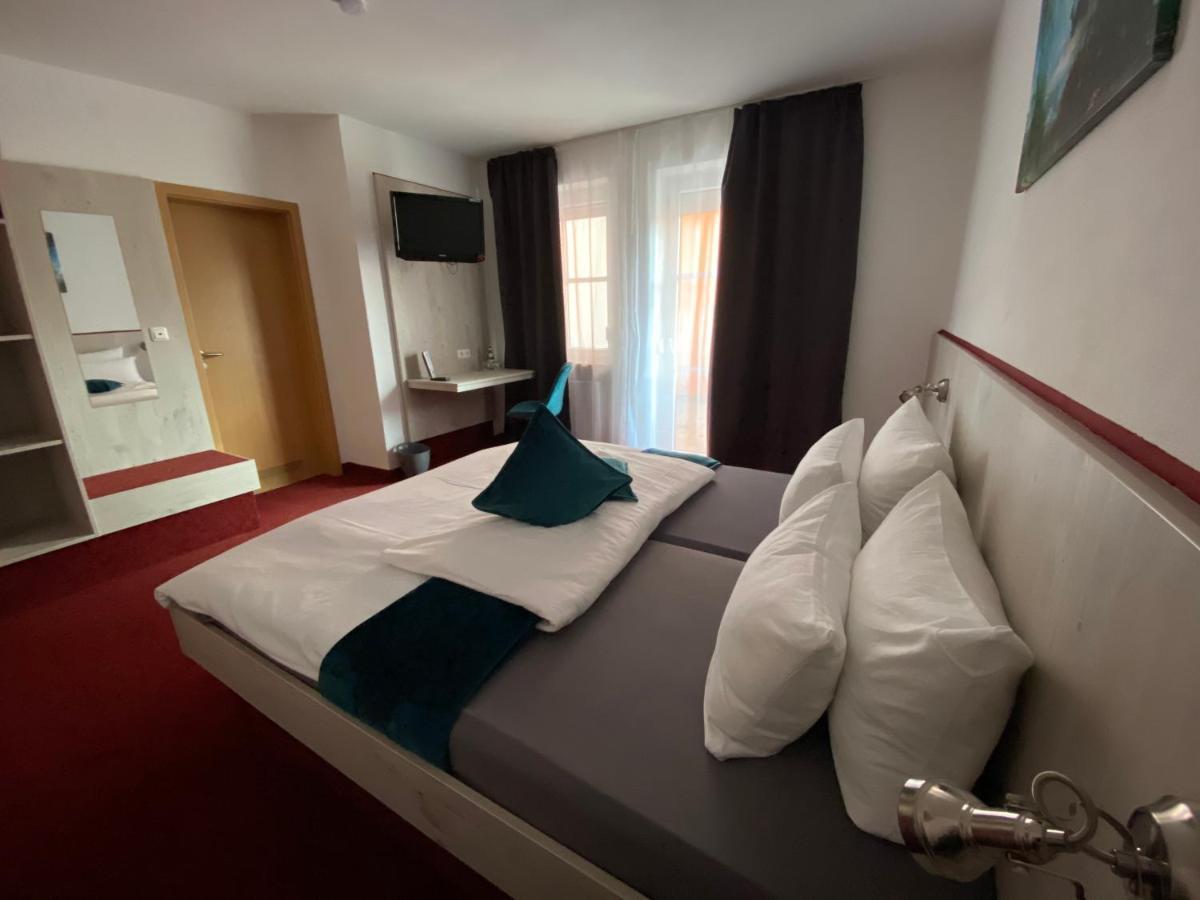 Hotel Wilder Mann Feuchtwangen Bagian luar foto